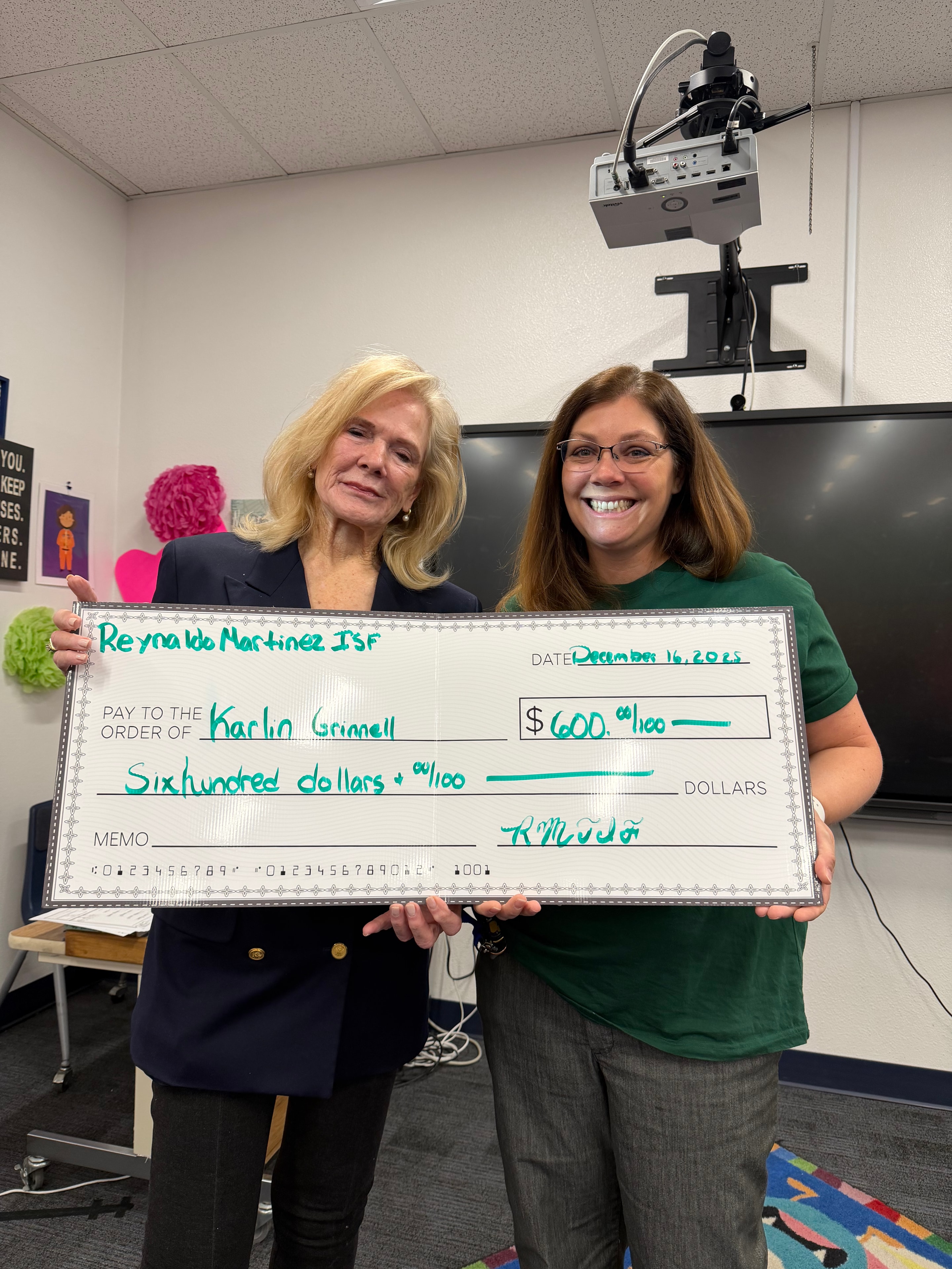 Karlin Grinnell receiving a $600 grant for Classroom Grant